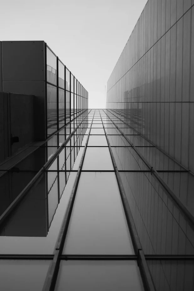 greyscale-roof-modern-building-with-glass-windows-sunlight